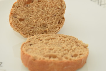 A slice of bread on a chopping board.