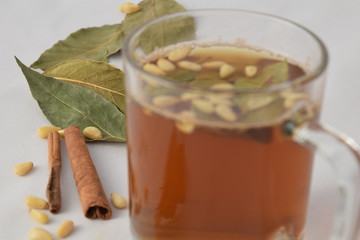 Tea with pine nuts bay leaves and cinnamon.