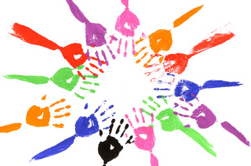 Circle of painted arms and hands friendship teamwork all for one photo white background