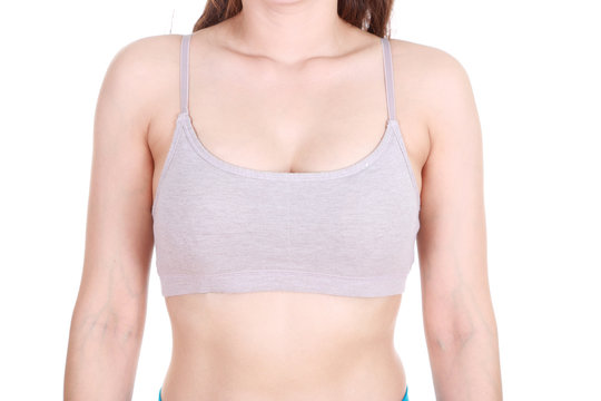 woman's chest in her sports bra