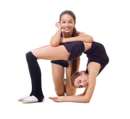 Fototapeta na wymiar Two girls engaged art gymnastic