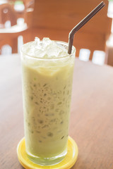 Glass of iced green tea latte