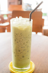 Glass of iced green tea latte