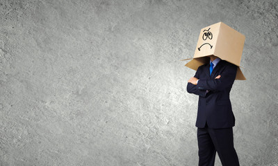 Man with box on head