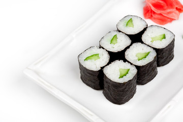 Sushi roll with cucumber and cheese.