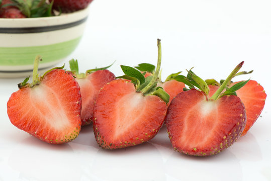 Fresh slice strawberry isolated on white background