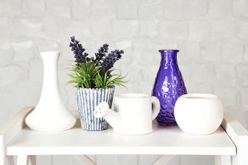 Interior with decorative vases and plant