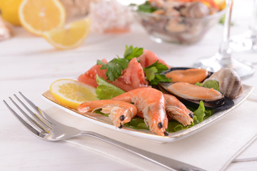 Tasty seafood on plate on table close-up