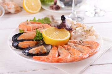 Tasty seafood on plate on table close-up