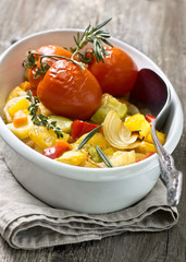 roasted vegetables in a white dish