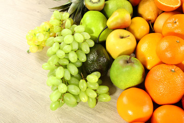 Assortment of exotic fruits on wooden table