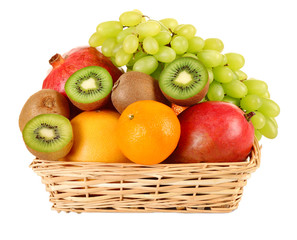 Assortment of fruits in basket isolated on white