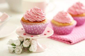 Delicious cupcakes on table  close-up