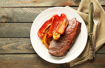 Composition with tasty roasted meat and vegetables