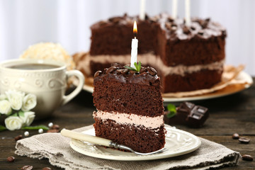 Delicious chocolate cake on table on light background