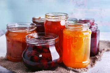 Rolgordijnen Homemade jars of fruits jam © Africa Studio