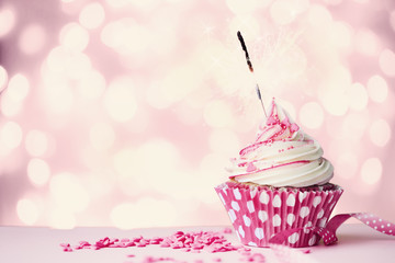 Pink cupcake with sparkler