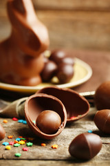 Chocolate Easter Eggs on wooden background