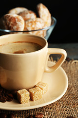 Cup of coffee and tasty cookies