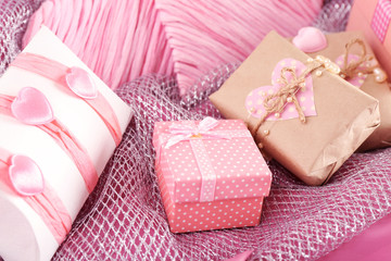 Fototapeta na wymiar Handmade gifts on Valentine Day, on fabric background