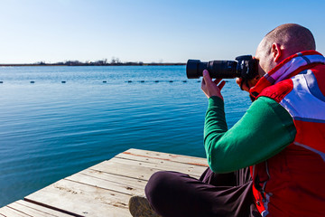 Obraz premium Photographer take photo