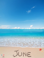 Fototapeta premium june on a tropical beach under clouds