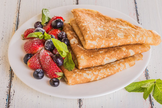 Homemade Crepes With Berries And Fruit