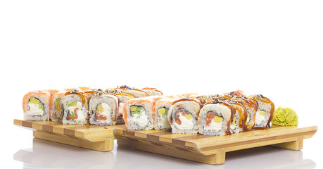 Salmon and eel sushi rolls on white background