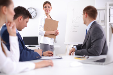 Business people sitting and discussing at business meeting