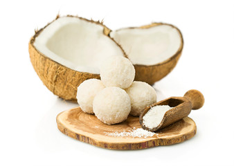 candies in coconut flakes and fresh coconut