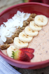 Porridge with fruits and coconut chips