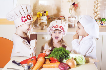 the children boy and girl prepare food in the kitchen