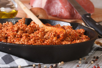 Bolognese sauce in a frying pan close-up horizontal