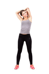 Fototapeta premium Woman stretching triceps over her head