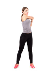 Young beauty stretching arm triceps