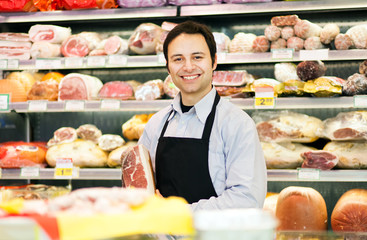 Butcher in his supermarket