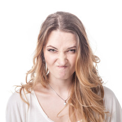 Girl playing various emotions in studio