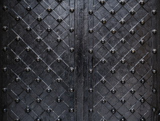 éléments noirs de texture métallique de la vieille porte