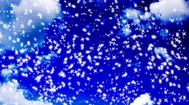 abstract snowflake star background against a blurry blue sky