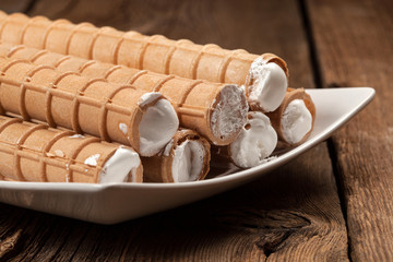 Sweet tube with whipped cream.