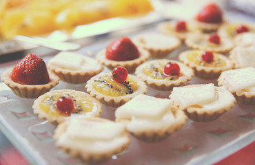 Sweets on banquet table, toned