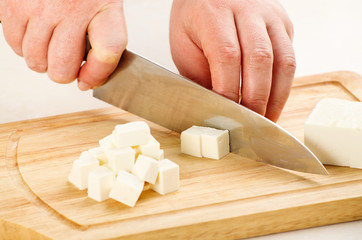 cutting the cheese feta © yuryrumovsky