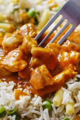 Chicken curry with basmati rice and green peas