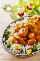 Chicken curry with basmati rice and green peas