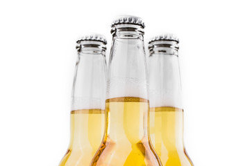 three bottles of beer isolated on white