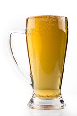 full glass of beer isolated on white with a foam