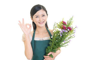 花束を持つ女性