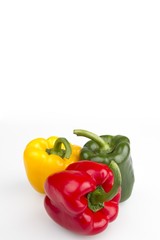 Colourful peppers white background