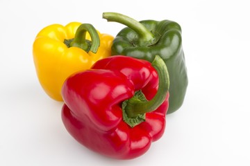 Colourful peppers white background