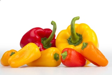 Colourful peppers white background